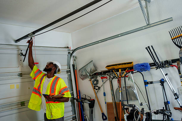 Professional Garage Door Panel Replacement technician working in Seneca County County, OH